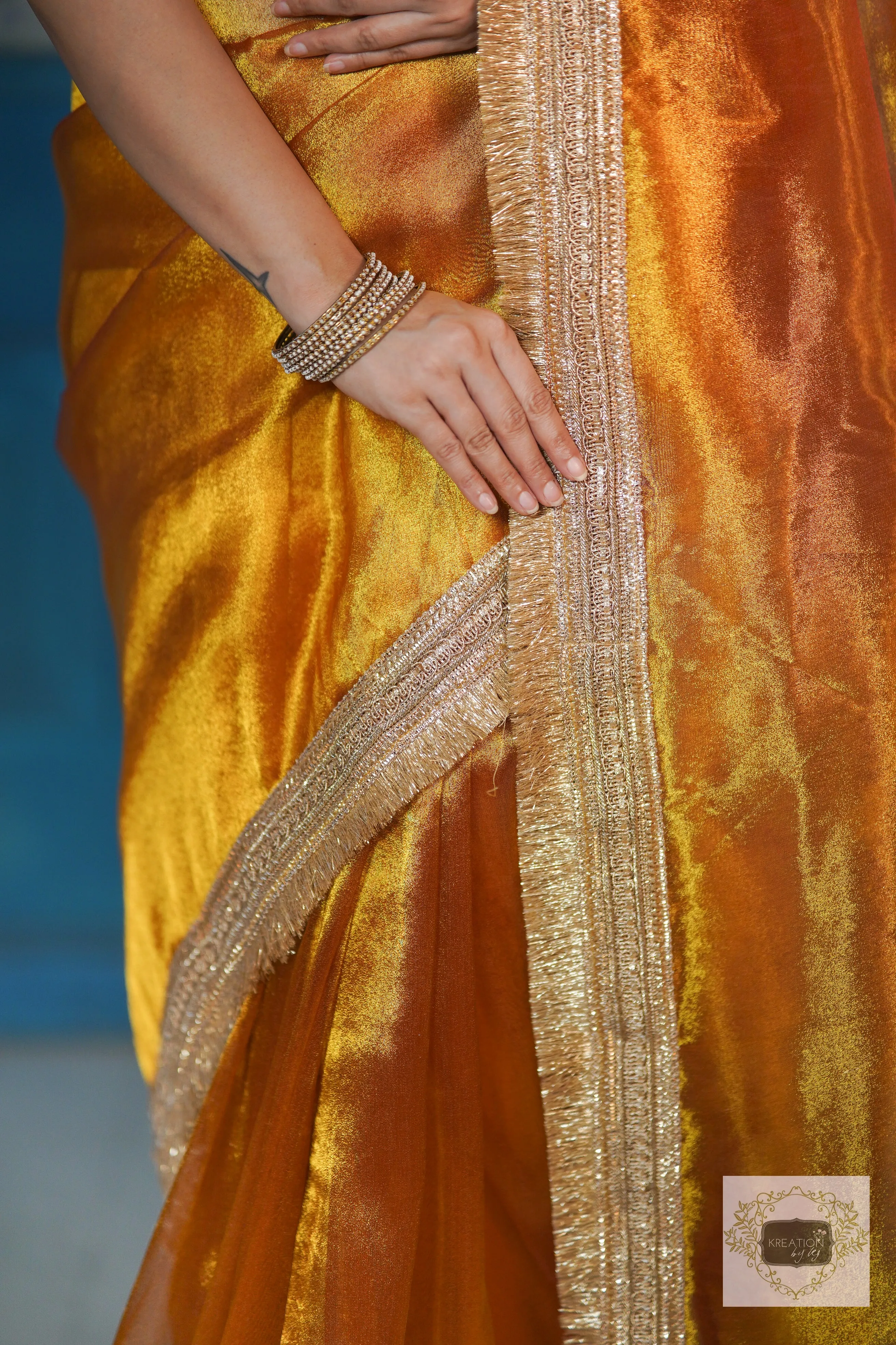 Elegant Banno Saree with Fiery Gold Zari on Tissue Fabric