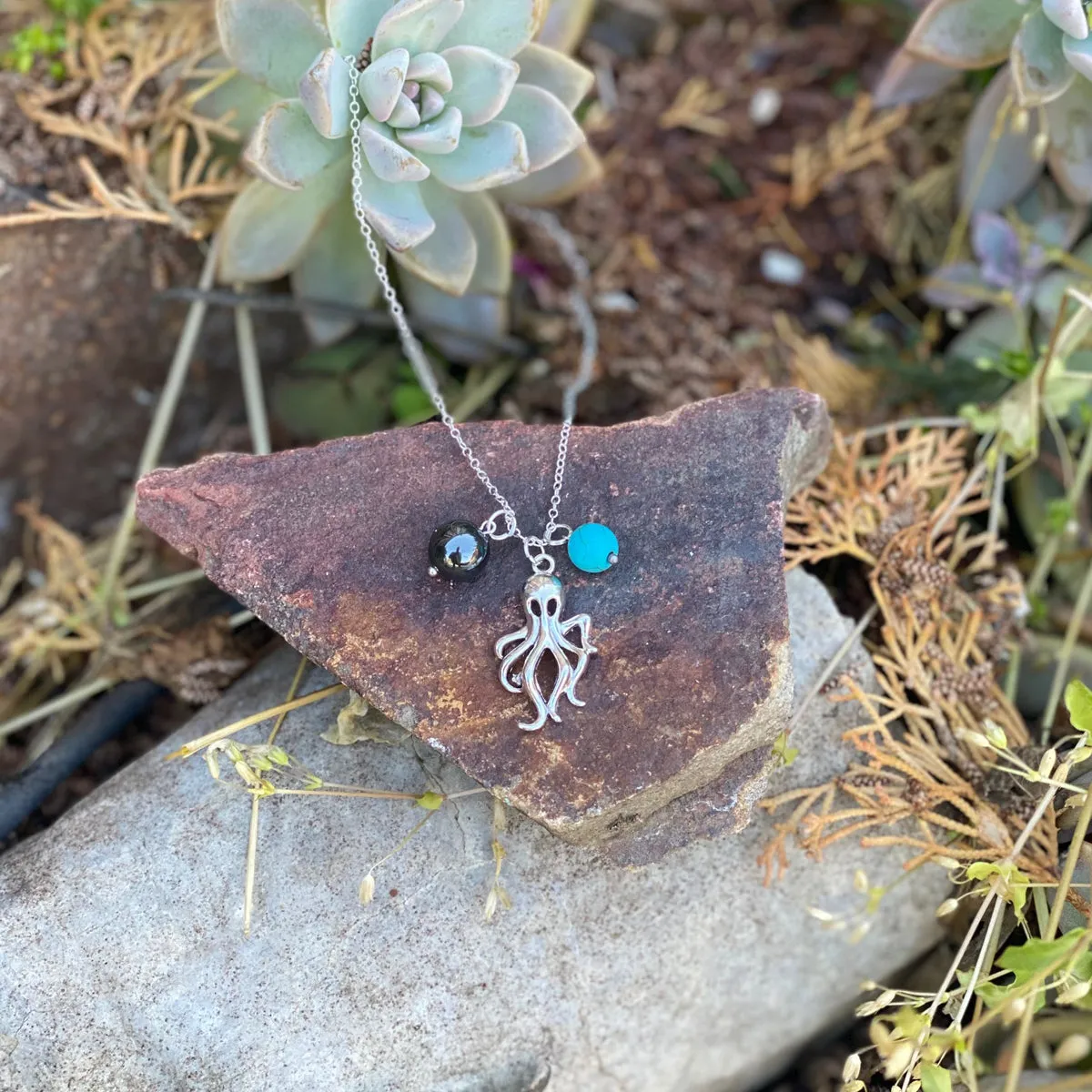 Octopus Ocean Charm Necklace with Hematite and Turquoise Howlite to Symbolize Adaptability