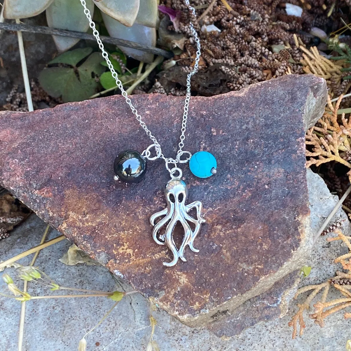 Octopus Ocean Charm Necklace with Hematite and Turquoise Howlite to Symbolize Adaptability