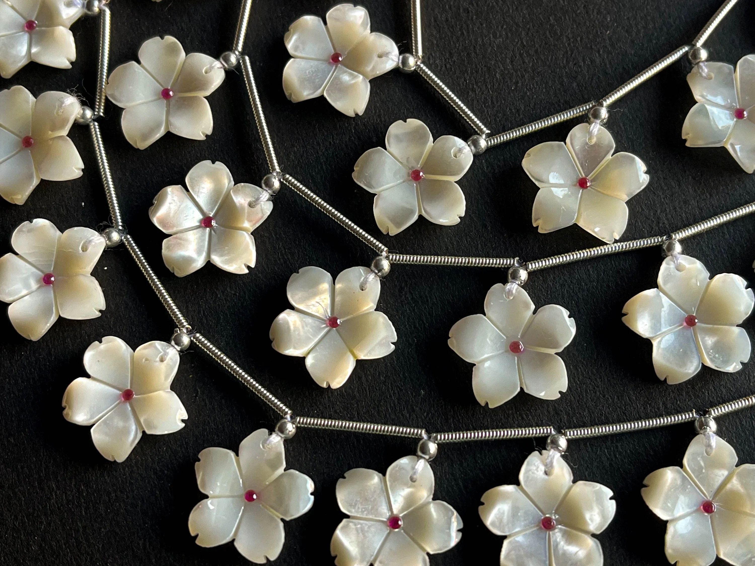 White Mother of Pearl Flower Carved Beads with Pink Cubic Zirconia